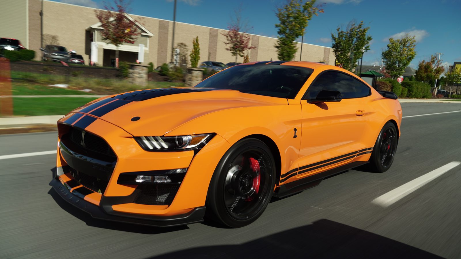Detailed orange Shelby GT500 on the road near Durham, North Carolina