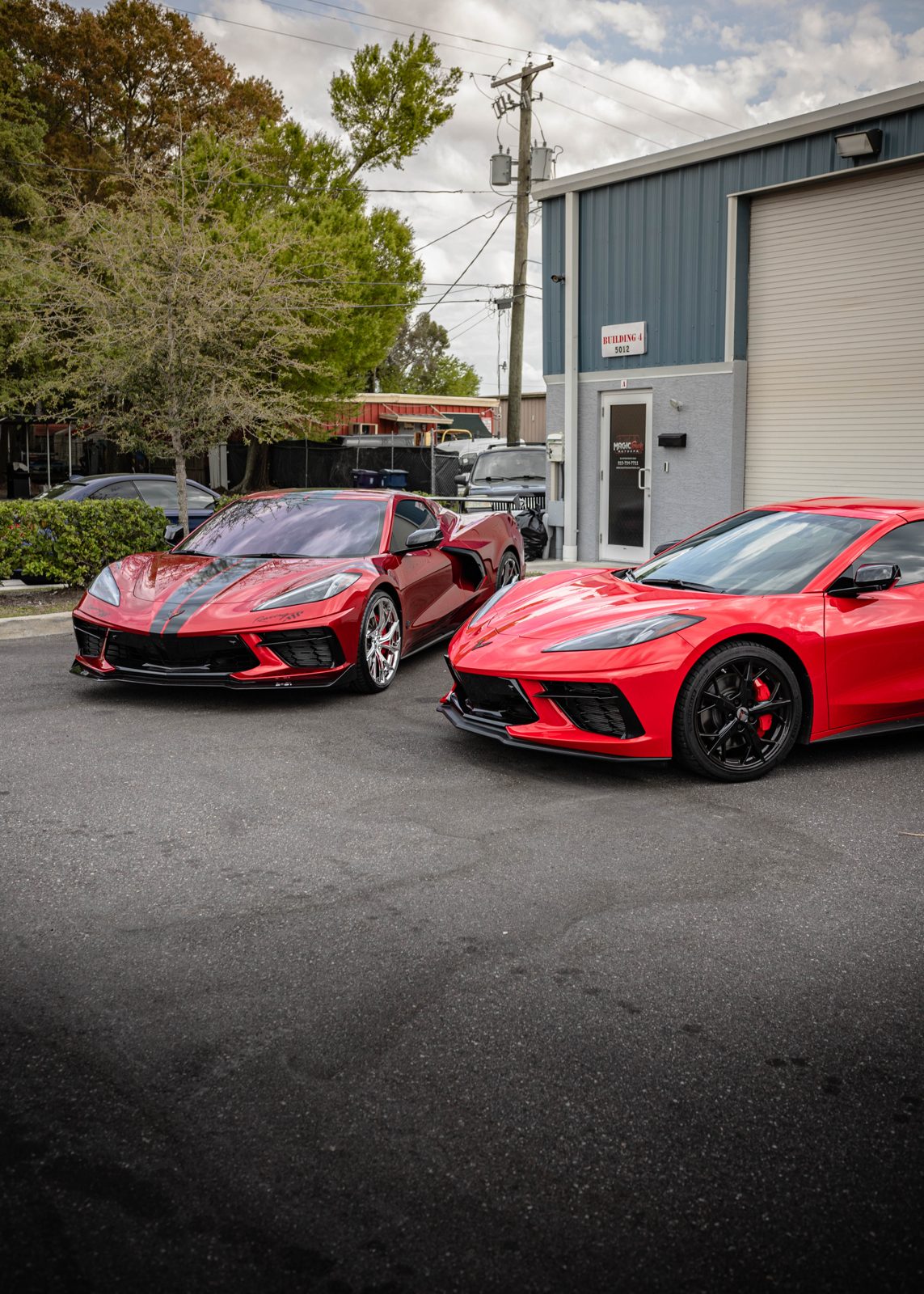 Detailed supercar lineup at an Obsidian detailing shop serving the Durham area