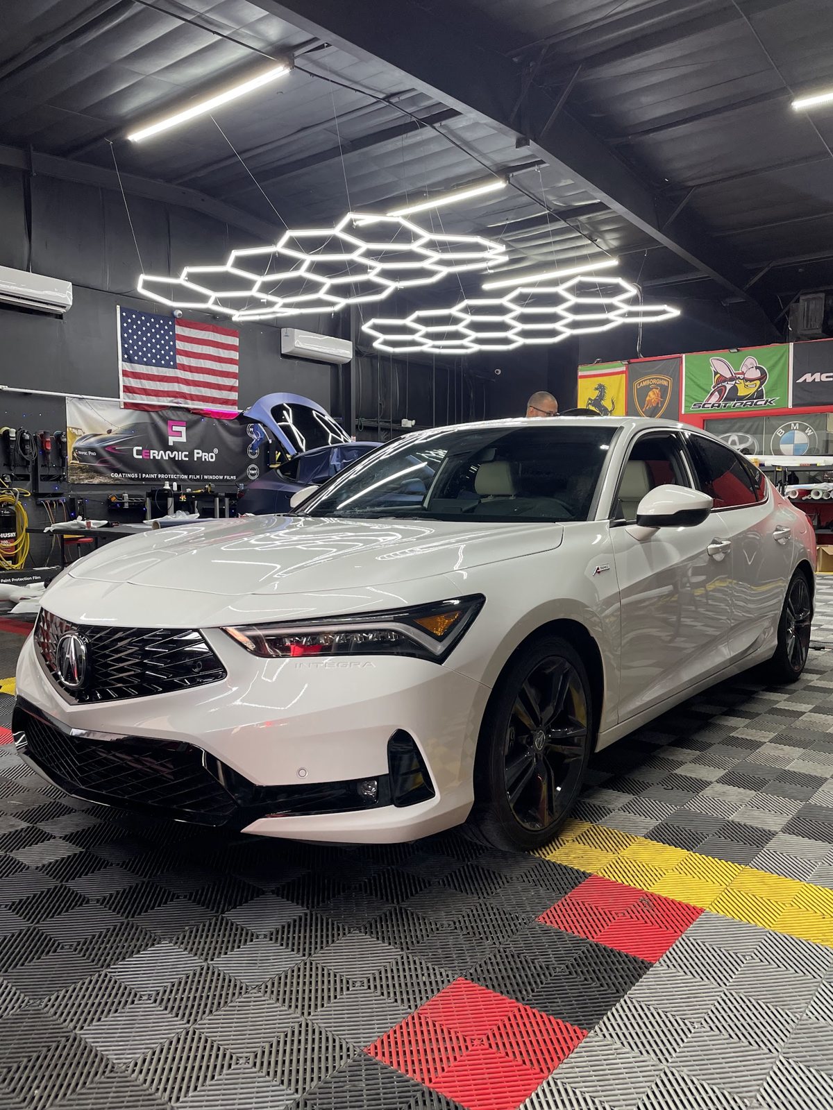 White Acura sedan mobile detailed to a studio finish in Durham, NC